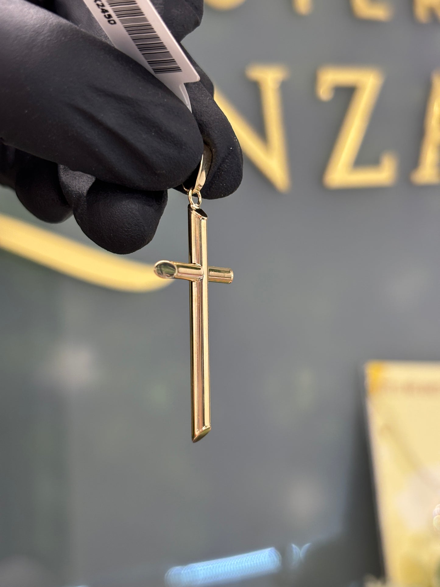 Cruz de oro de 10k