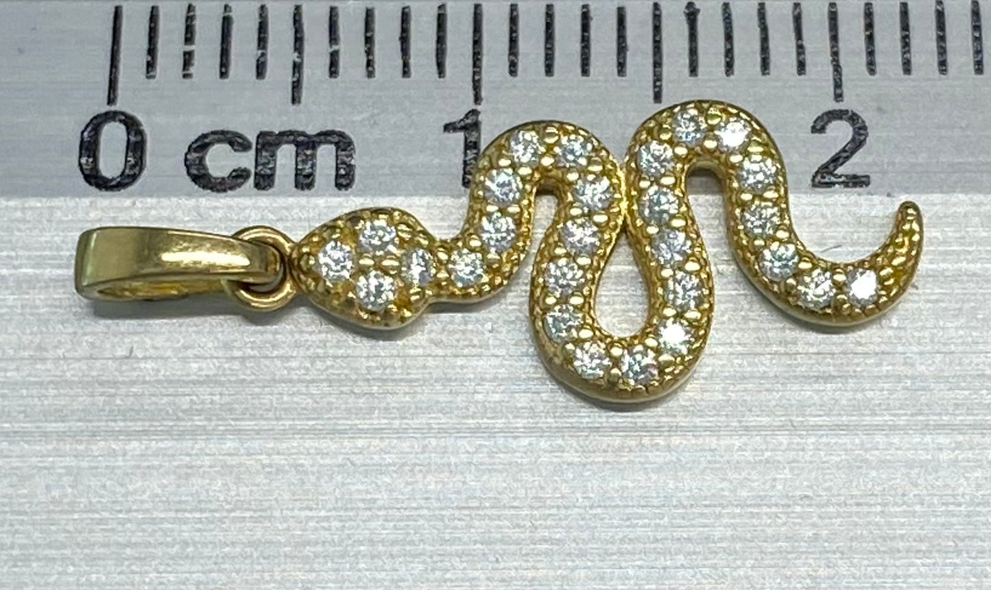 Dije oro 10k serpiente con circonia blanca