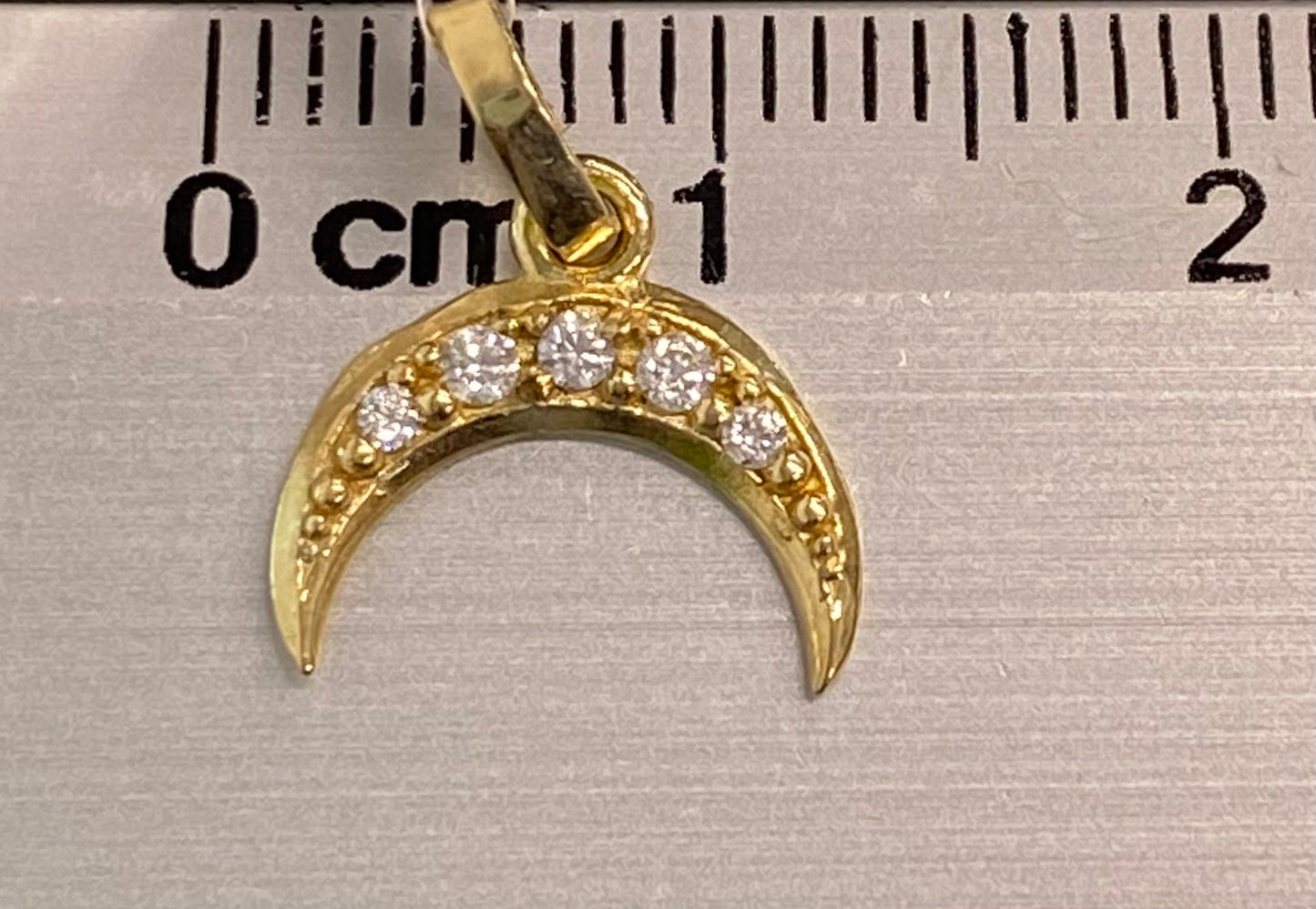 Dije oro 10k luna.