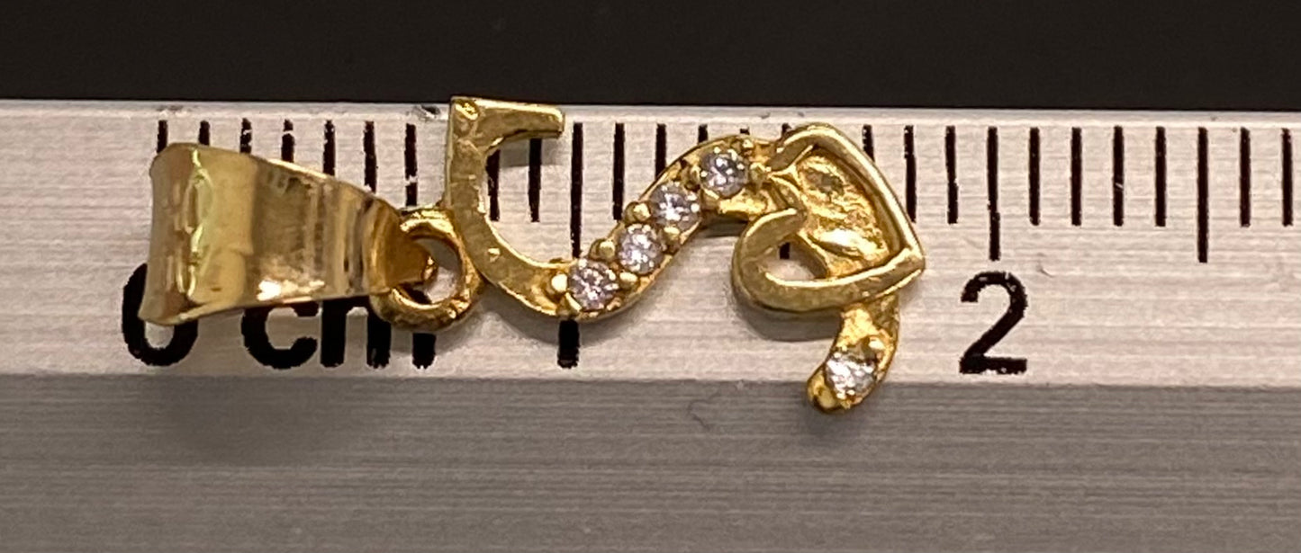 Dije oro 10k inicia “S”