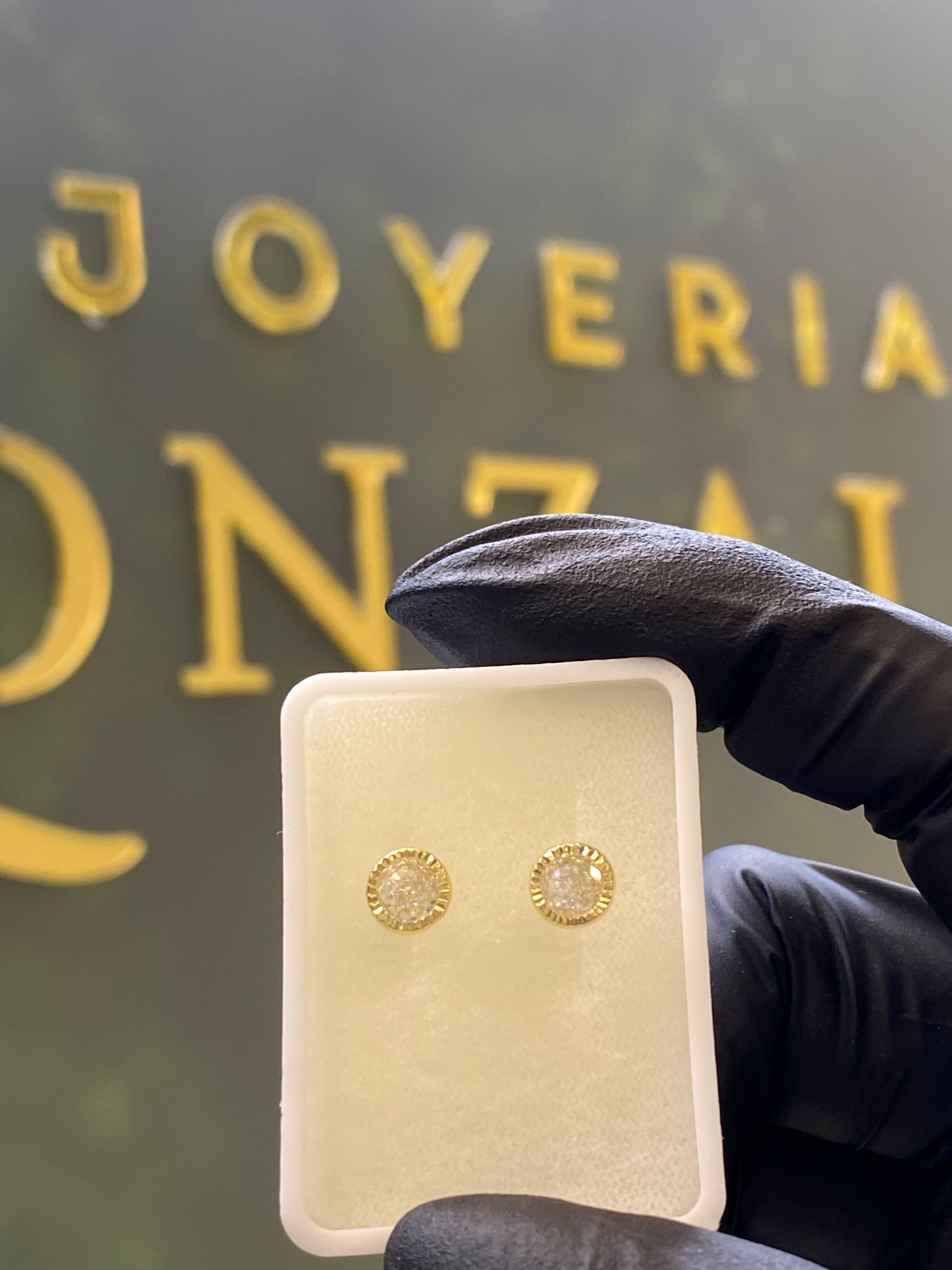 Broquel oro 10k blanco