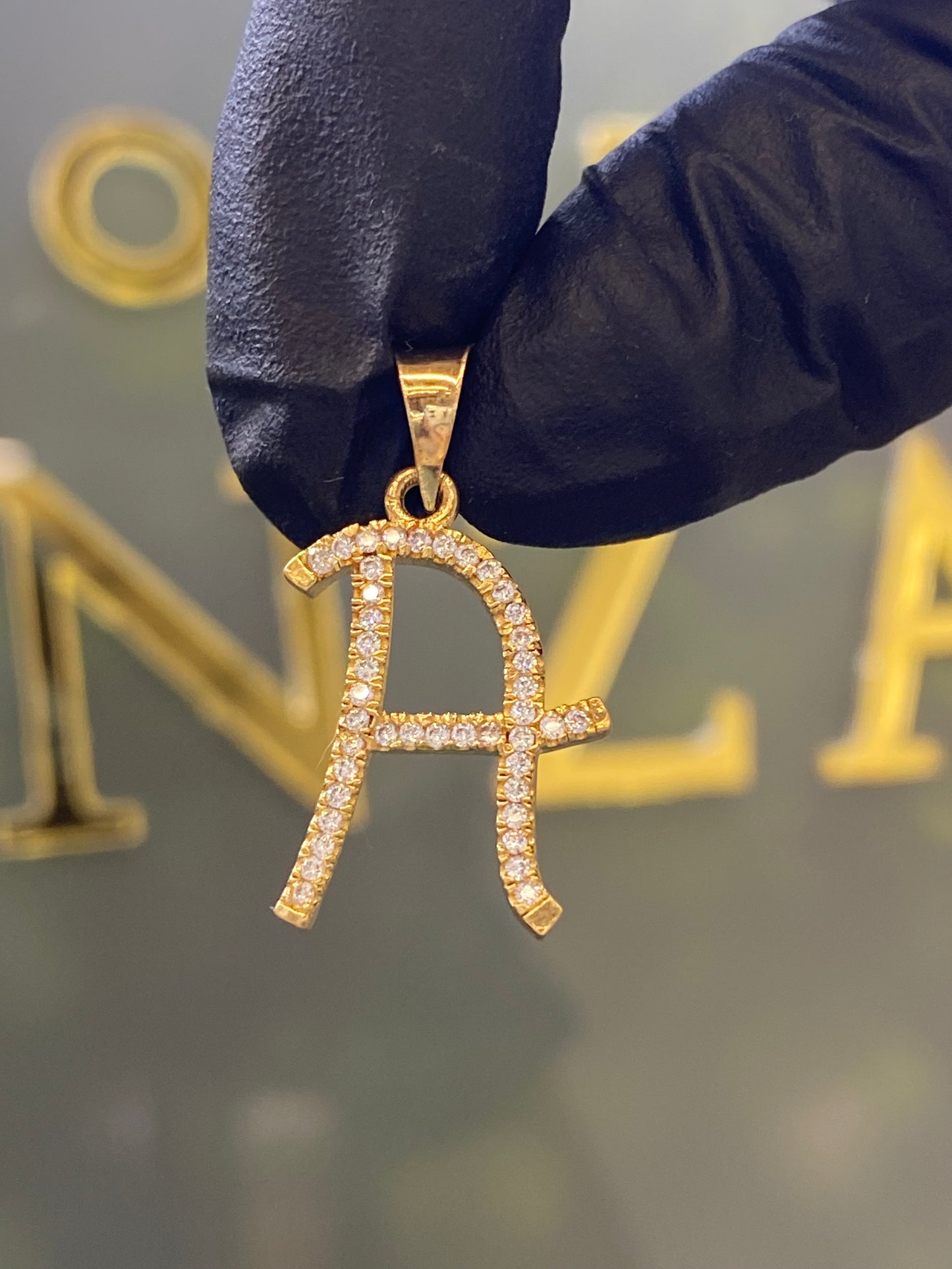 Dije oro 10k inicial “A”