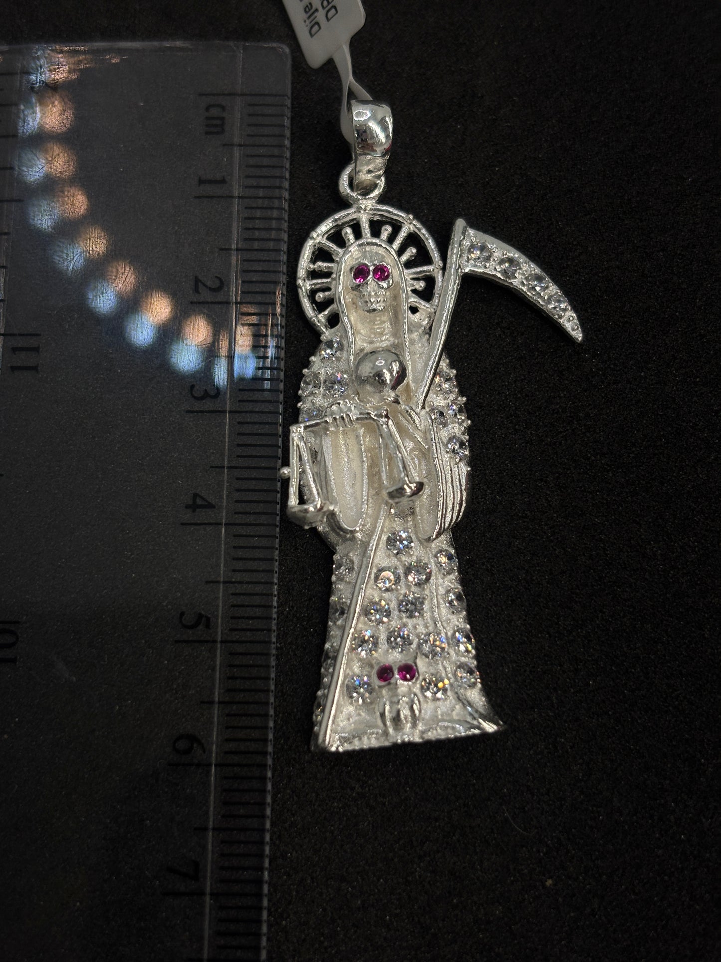 Dije plata santa muerte