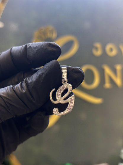 Inicial G cursiva plata