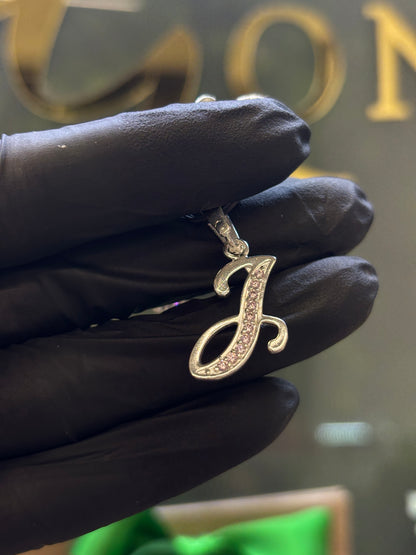 Inicial J cursiva plata
