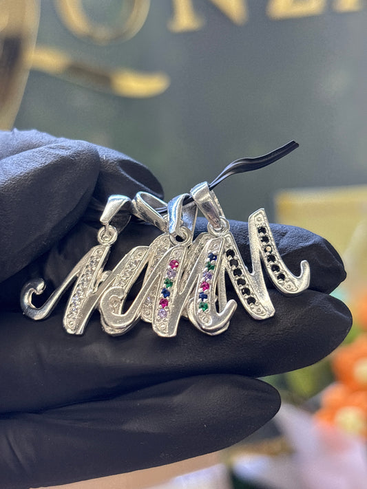 Inicial M cursiva plata
