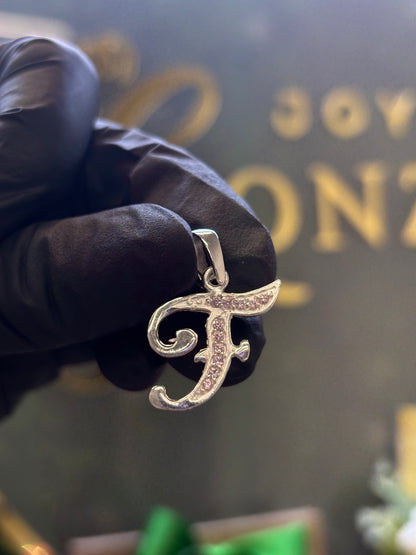 Inicial F cursiva plata