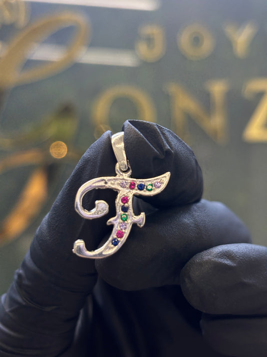 Inicial F cursiva plata