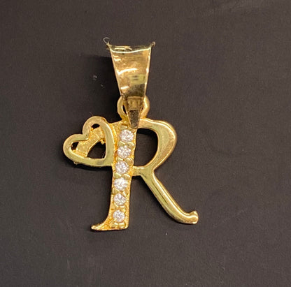 Dije oro 10k inicial “R”