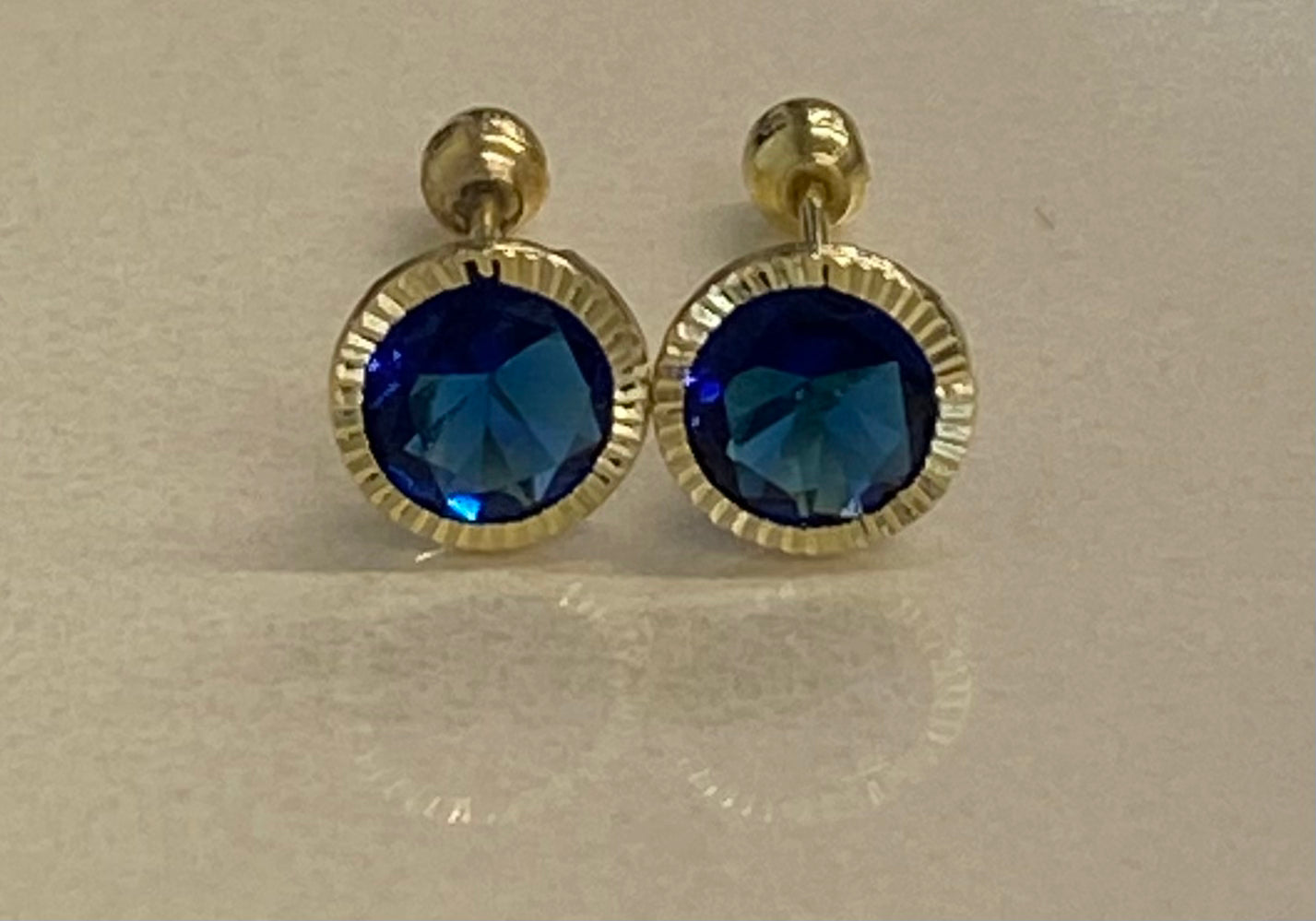Broquel oro 10k azul