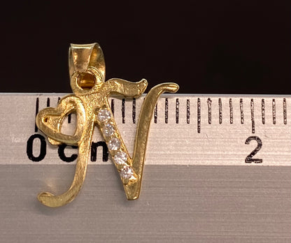 Dije oro 10k inicial “N”