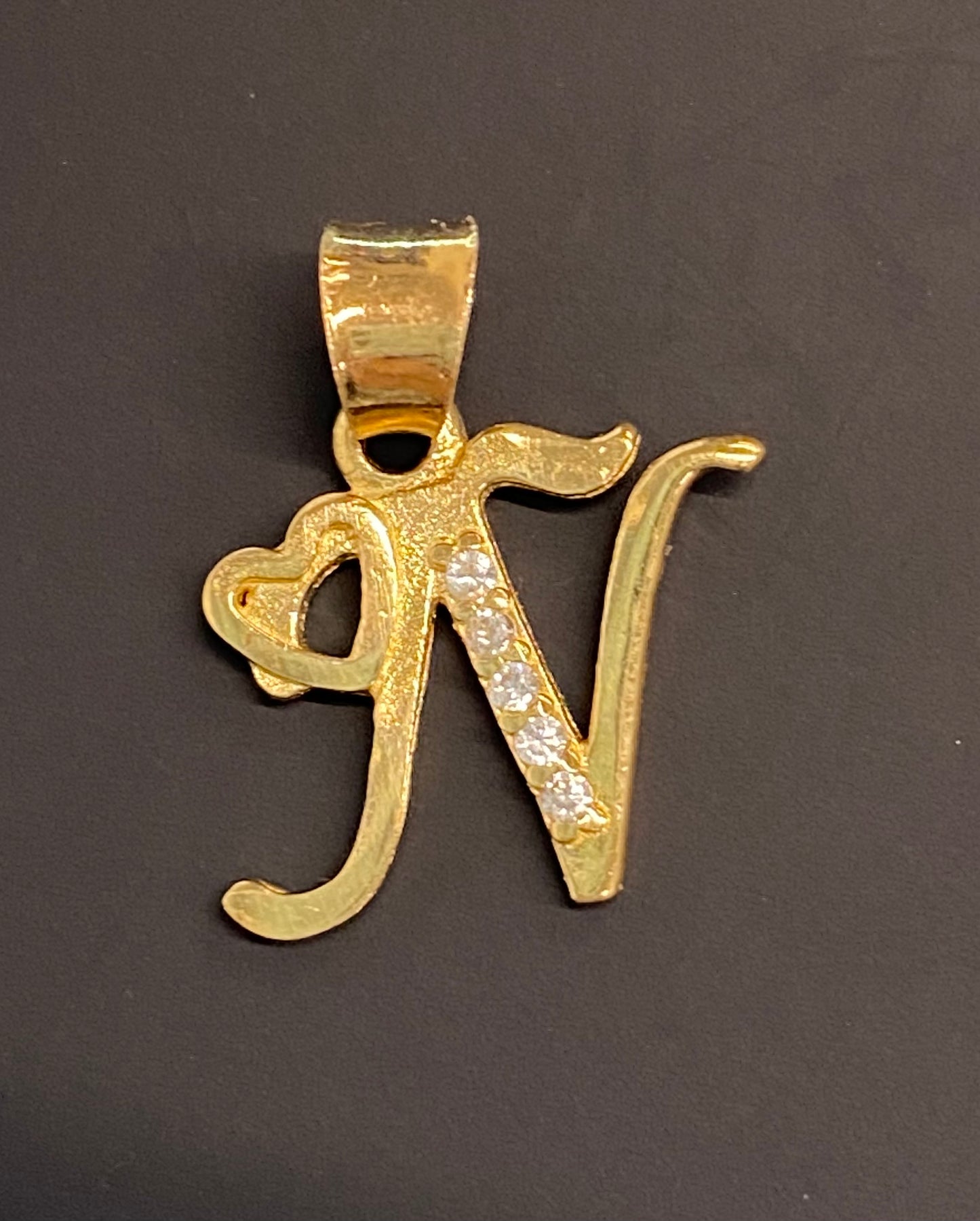 Dije oro 10k inicial “N”