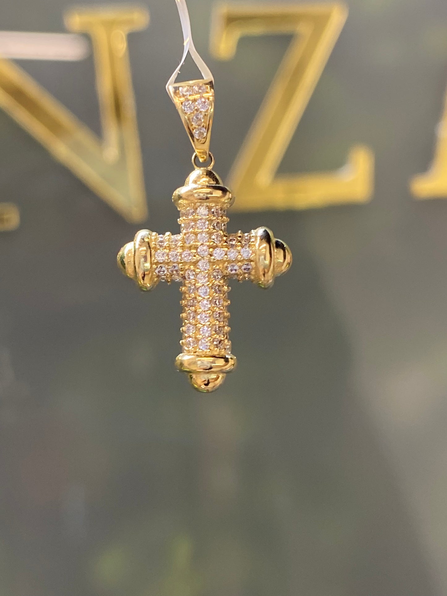 Dije oro 10k Cruz con circonia