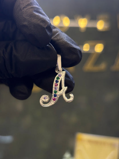 Inicial A cursiva plata